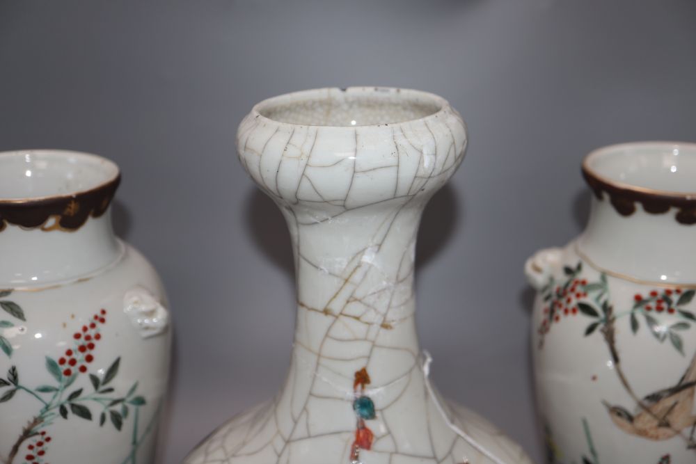 A pair of Chinese ovoid vases with bird, foliate and wheatsheaf decoration and a Chinese Garlic-Head crackle-glazed vase,